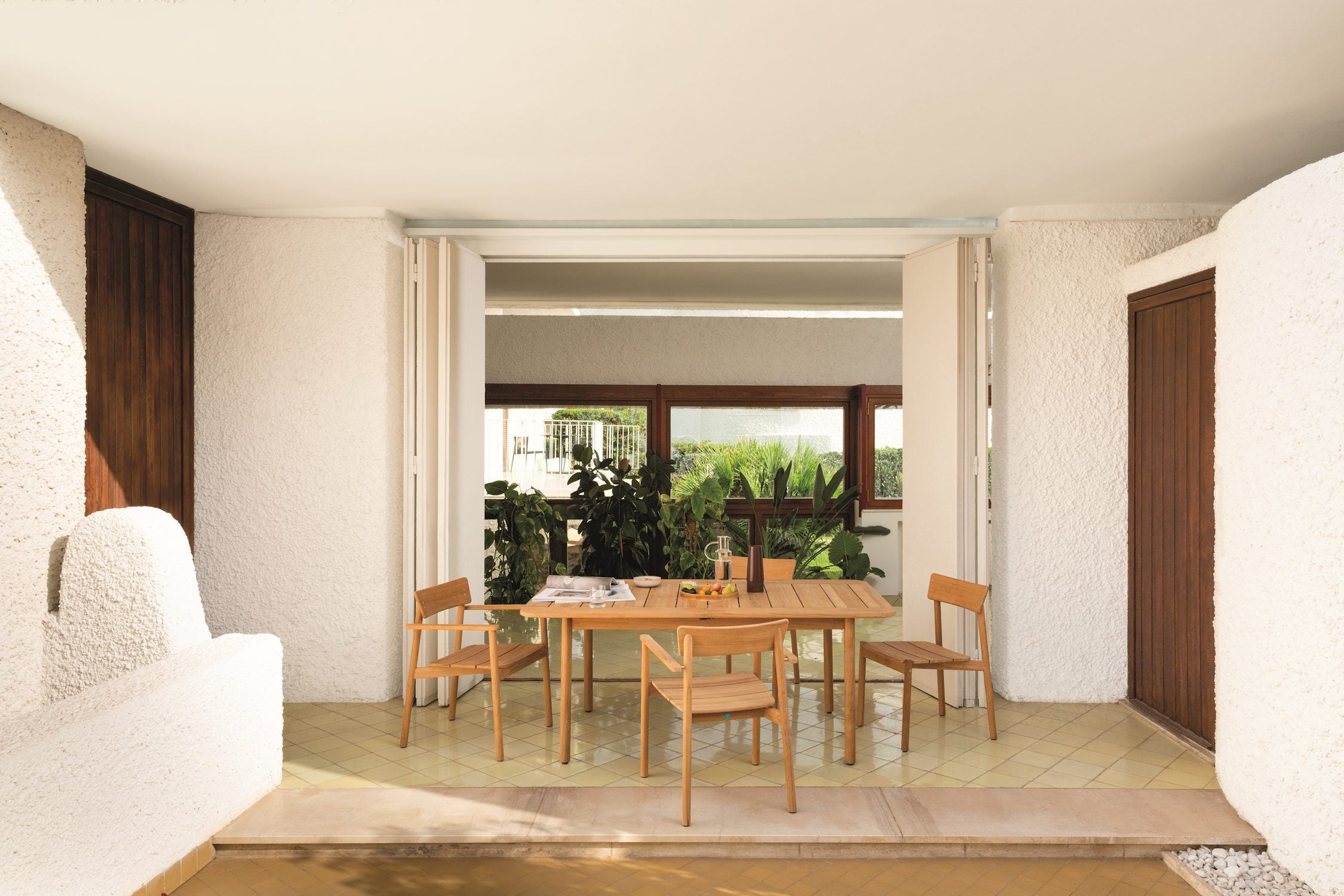 Pevero Small Armchair in Teak